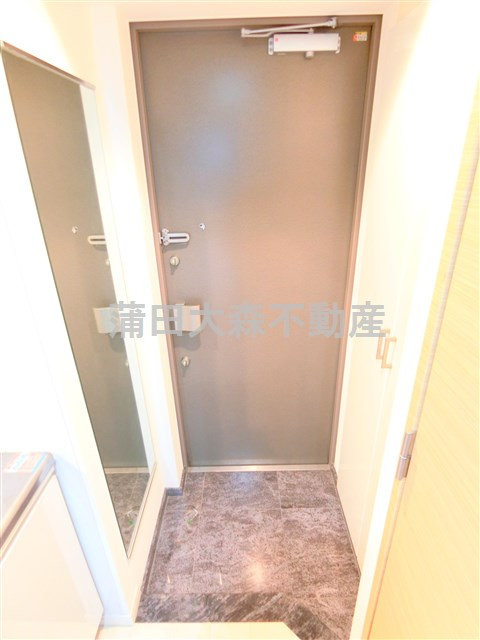 スカイコートパレス蒲田の玄関