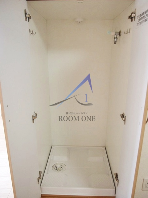 ルーブル多摩川九番館の設備|洗濯機置き場です。