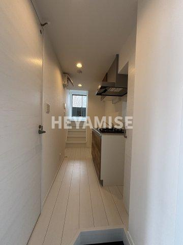 デ・クメール貝津の玄関