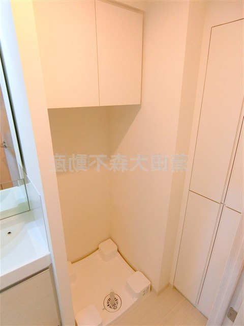 アジールコート蒲田の設備|棚付きの室内洗濯機置き場