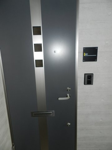 プチメゾン輪西のエントランス