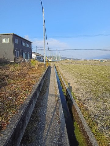 西条市玉津229-7　売土地の周辺|南側　農道