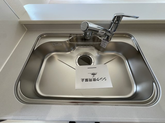 あきる野市伊奈　新築戸建全15棟のキッチン|浄水器付きシンク