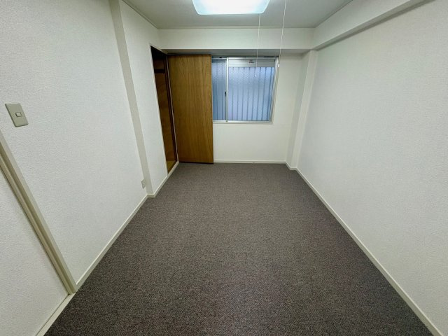 光栄ハイツ千里丘の寝室