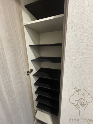 プランドール新北野の玄関