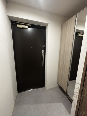 プランドール新北野の玄関