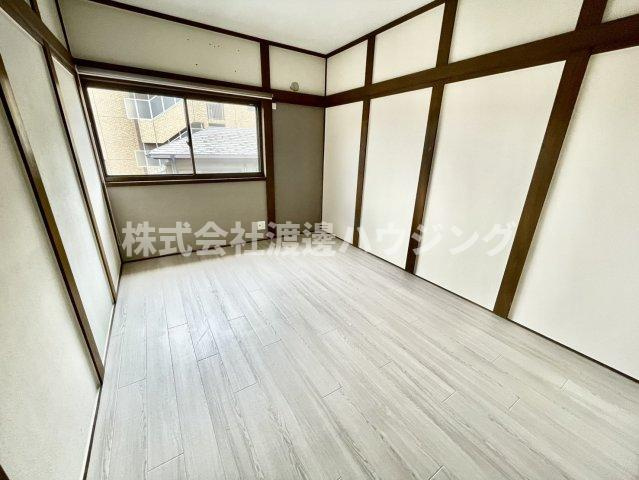 平野東2丁目貸家の寝室