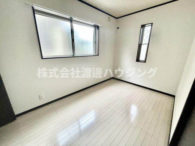 角田1丁目貸家の寝室