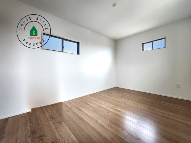 糟屋郡粕屋町戸原東1丁目第1-3棟（2号棟）の内観：施工例|落ち着いた色調の洋室です。