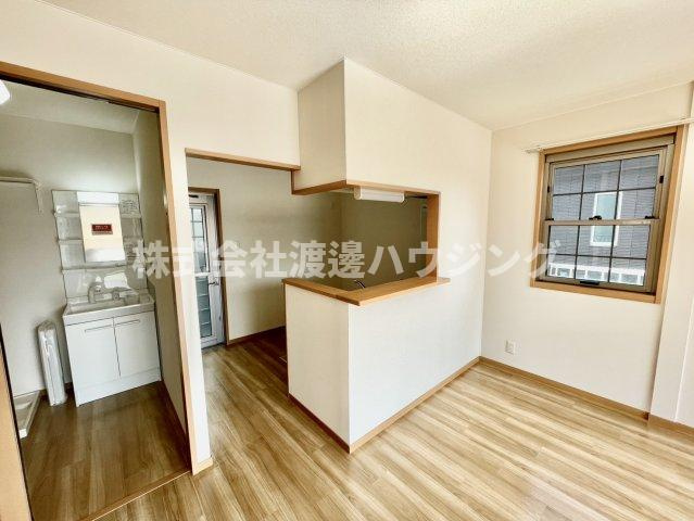 大塚様戸建貸家Ⅱの居間・リビング