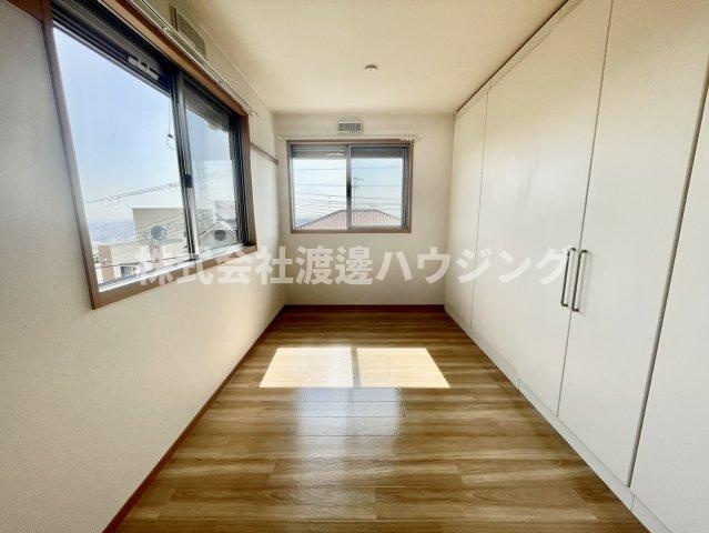 大塚様戸建貸家Ⅱの居間・リビング