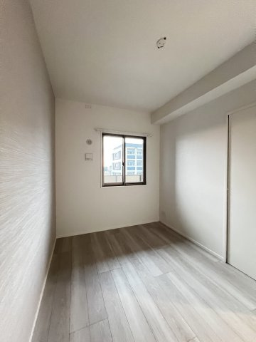 エンクレスト博多PARKSIDEの洋室