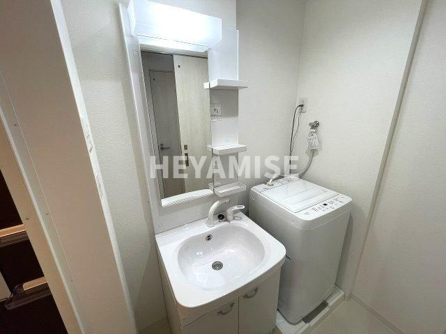 デ・クメール福田町の洗面所