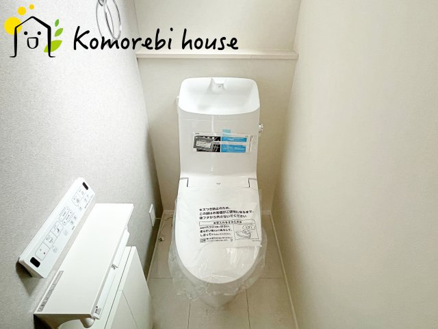 伊奈町寿　新築一戸建て　タマタウン　01のトイレ|落ち着いたトイレです