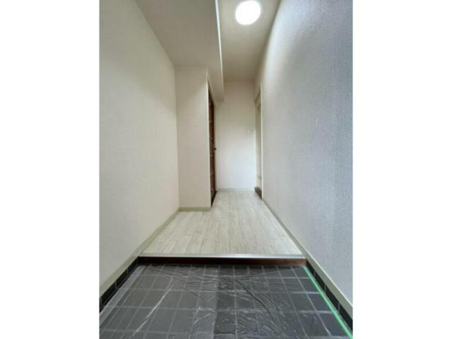 城西シティー彦和の玄関