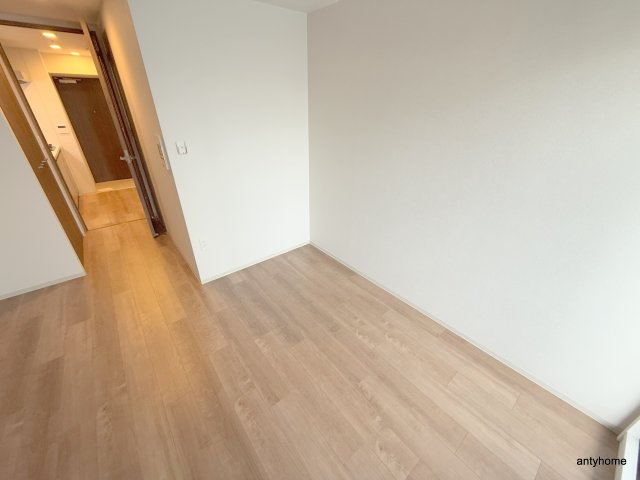 ファーストフィオーレ九条の寝室