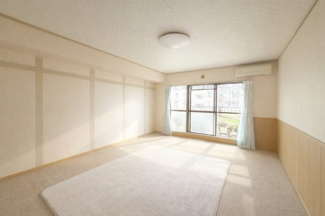 【居間・リビング】 | グリーンコープ松が谷 | ※本画像は居住者様の家具をCGで消した画像であり、現況と異なる場合がございます。