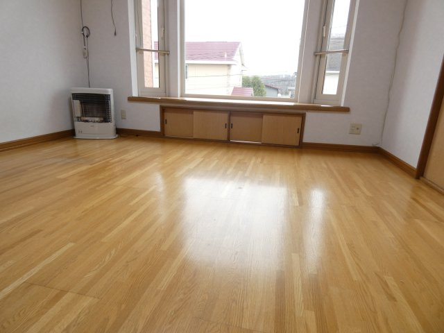 サニーハイツ（西23条）の居間・リビング