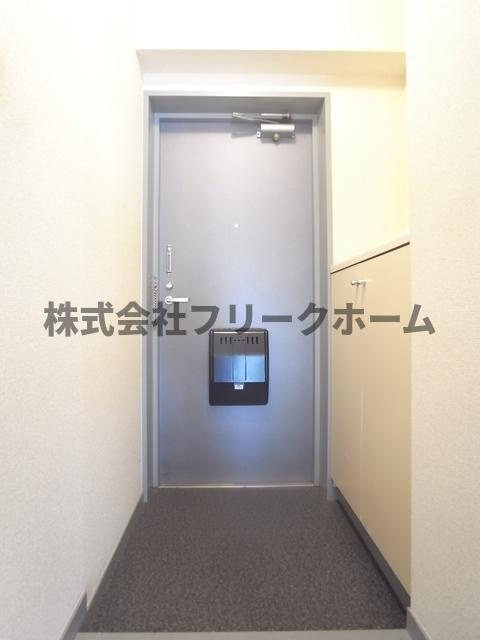 三鷹市井口５丁目の賃貸マンションの玄関