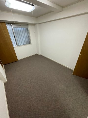 光栄ハイツ千里丘の寝室
