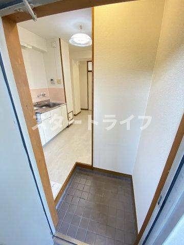 大阪市淀川区十三東１丁目の賃貸マンションの玄関