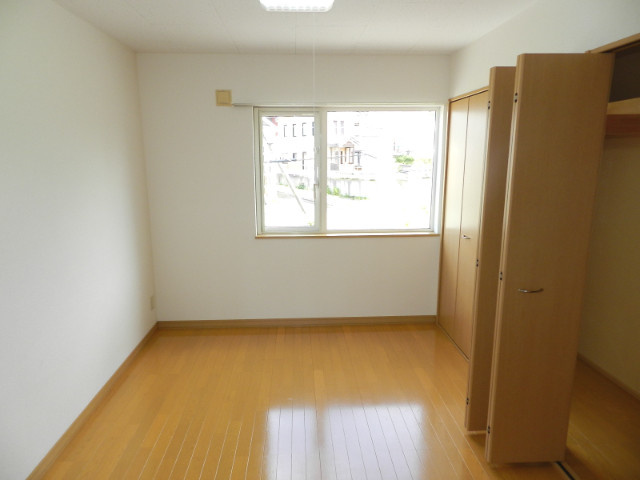 ハイツ夕陽ヶ丘の洋室