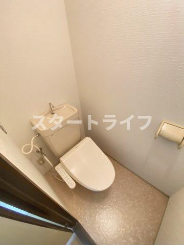 大阪市東淀川区西淡路３丁目の賃貸マンションのトイレ