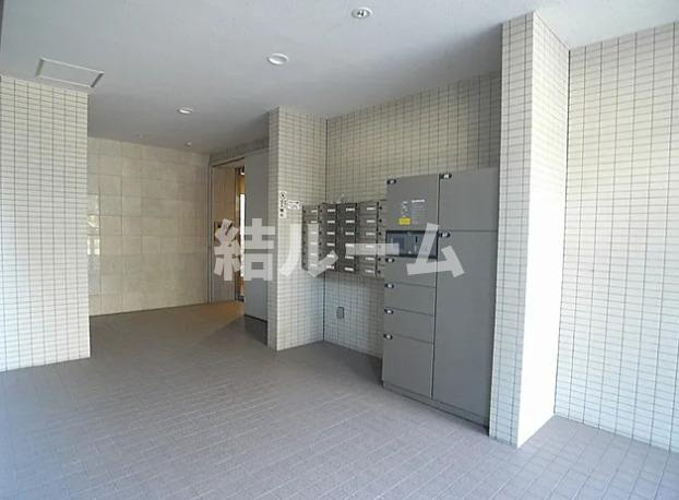 北区王子１丁目の賃貸マンションのエントランス