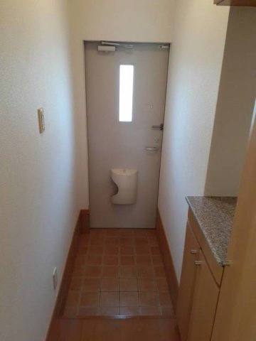 ラミアカ－メラ　ウーノの玄関