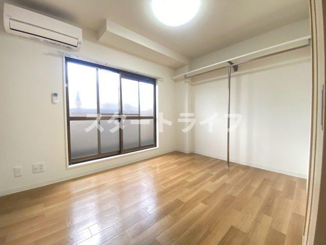 大阪市東淀川区淡路３丁目の賃貸マンションの寝室