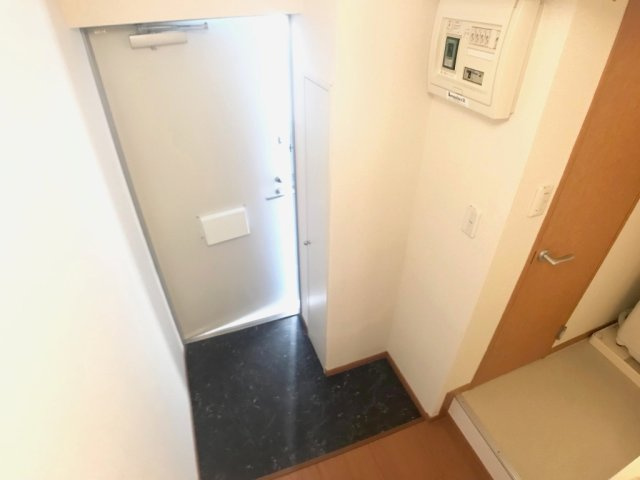 レオパレスＭＯＡＮＡの玄関