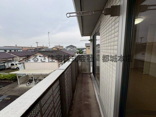 都城市下川東２丁目のアパートのバルコニー|A202の写真です