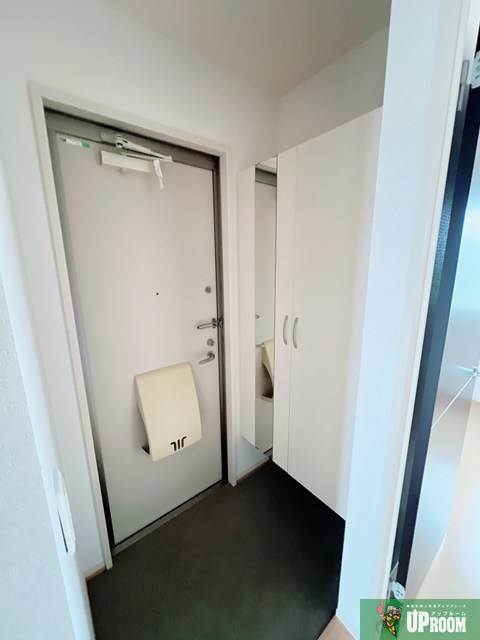 コゥジィコートの玄関