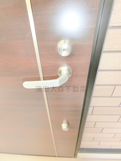 ソレイユ糀谷の玄関