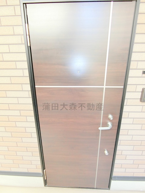 ソレイユ糀谷の玄関