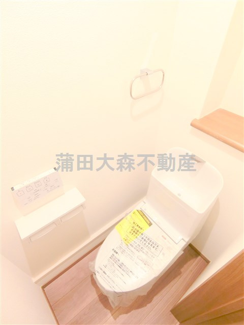 コンフォルトテンの居間・リビング|トイレ　温水洗浄便座