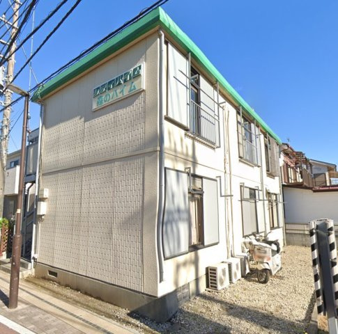 稲城市東長沼のアパートの外観