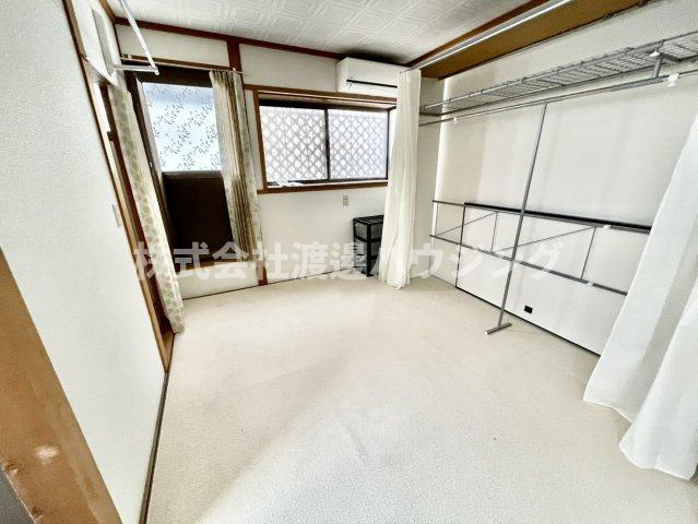 上新庄3丁目貸家の洋室
