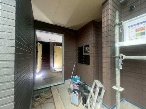 REGALEST千里丘都の玄関