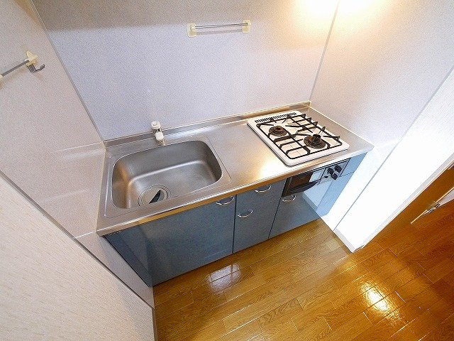 カネダマンションのキッチン|コンパクトなキッチンで掃除もラクラク