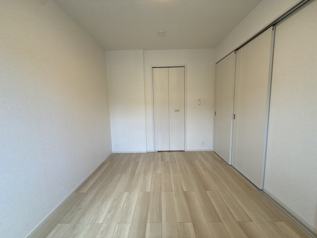 ヴィラ　ドゥ　グレーヌ梅ケ谷Ｂの寝室