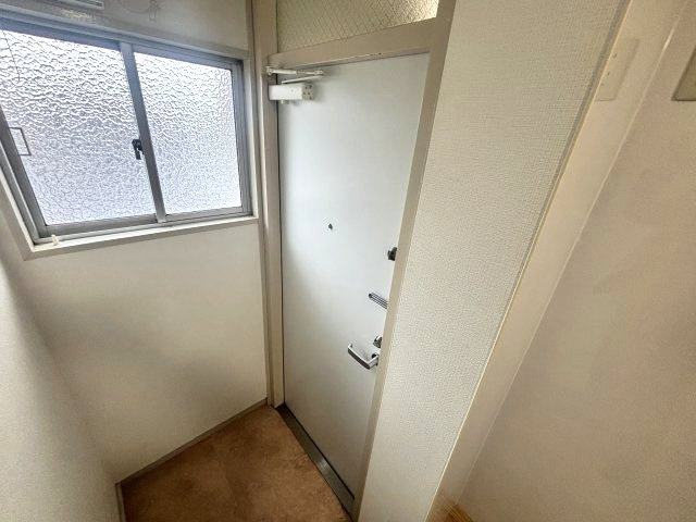 スエヒロマンション　の玄関