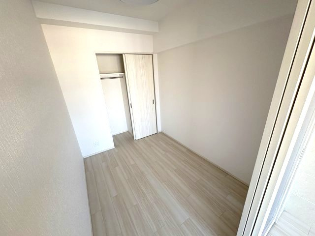 プレジオ日暮通の寝室