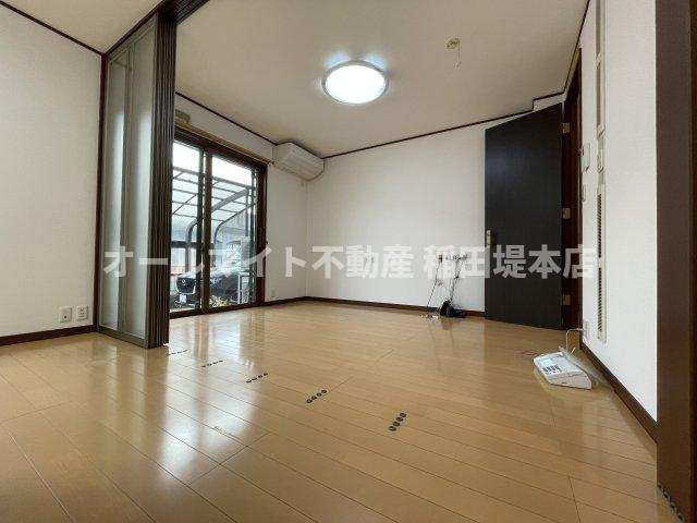 稲城市矢野口のアパートの寝室