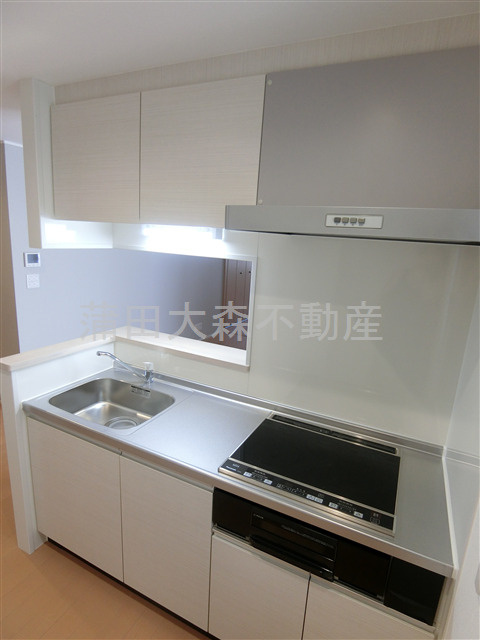 オーラヴァン池上のキッチン|3口IHグリル付システムキッチン