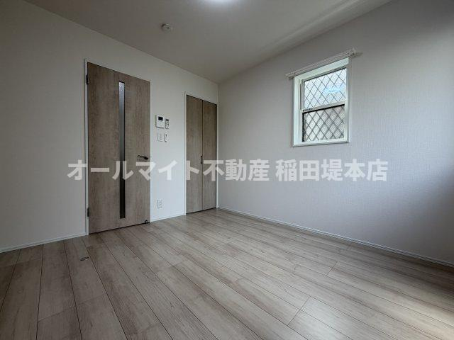 川崎市多摩区生田６丁目のアパートの居間・リビング