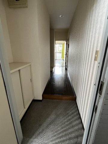 協栄マンションOYAMAの玄関