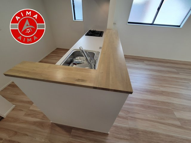 福岡市西区今宿2丁目第1-3棟（2号棟）の内観：施工例|ダイニングテーブルへの配膳がラクラク、お料理はかどるカウンター付きシステムキッチン！