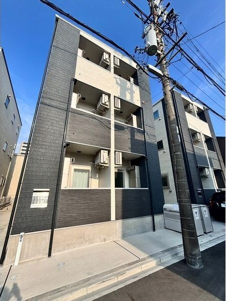 Lega庄内通(名塚二丁目A)北側の建物