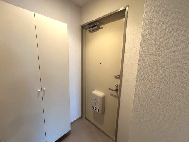 オズコート神戸本山の玄関